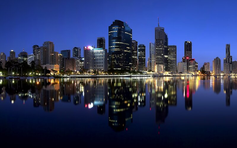City Skyline at Night — Blue, Serene, Photograph, Skyscrapers, Water