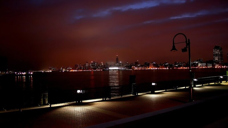 City Skyline at Night — Dark Red, Dramatic, Photograph, River, Pier, Streetlight