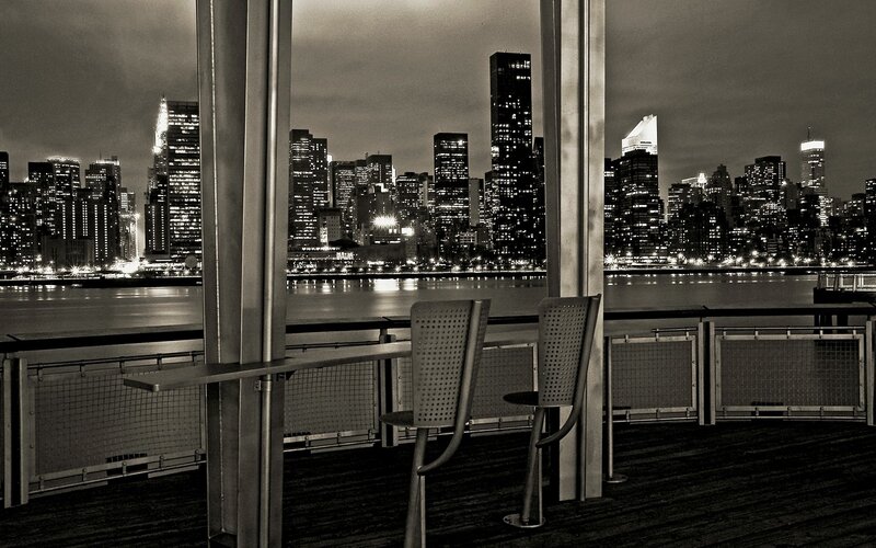 City skyline at night from balcony