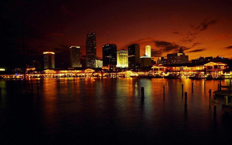 City Skyline at Night — Orange, Dramatic, Photograph, Buildings, Water, Sky