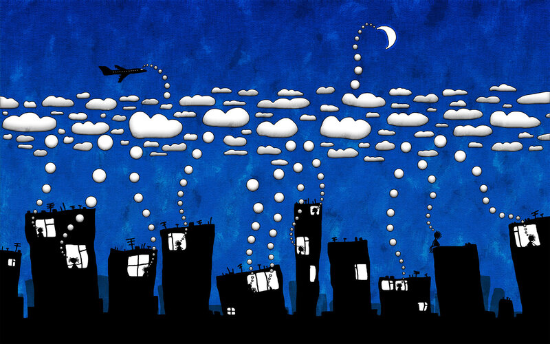 City skyline at night with airplane