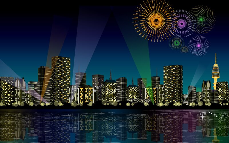 City skyline at night with fireworks
