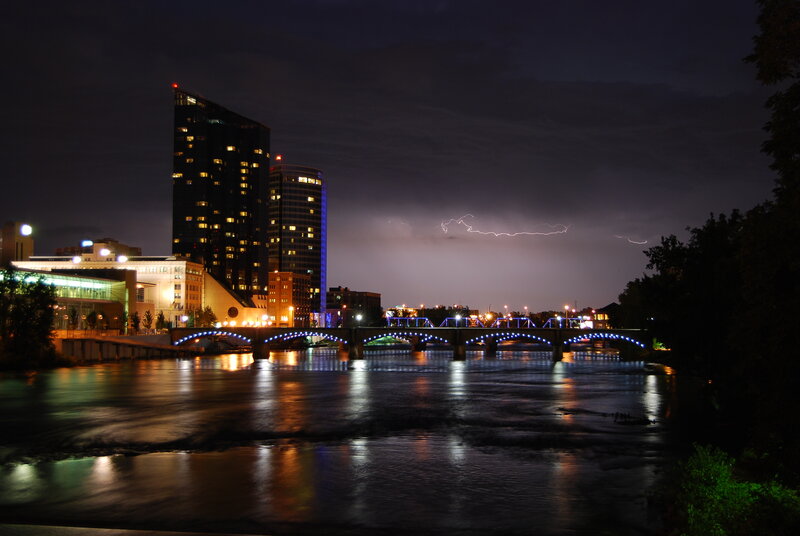 City skyline at night with lightning