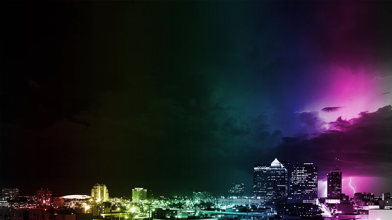 City skyline at night with lightning