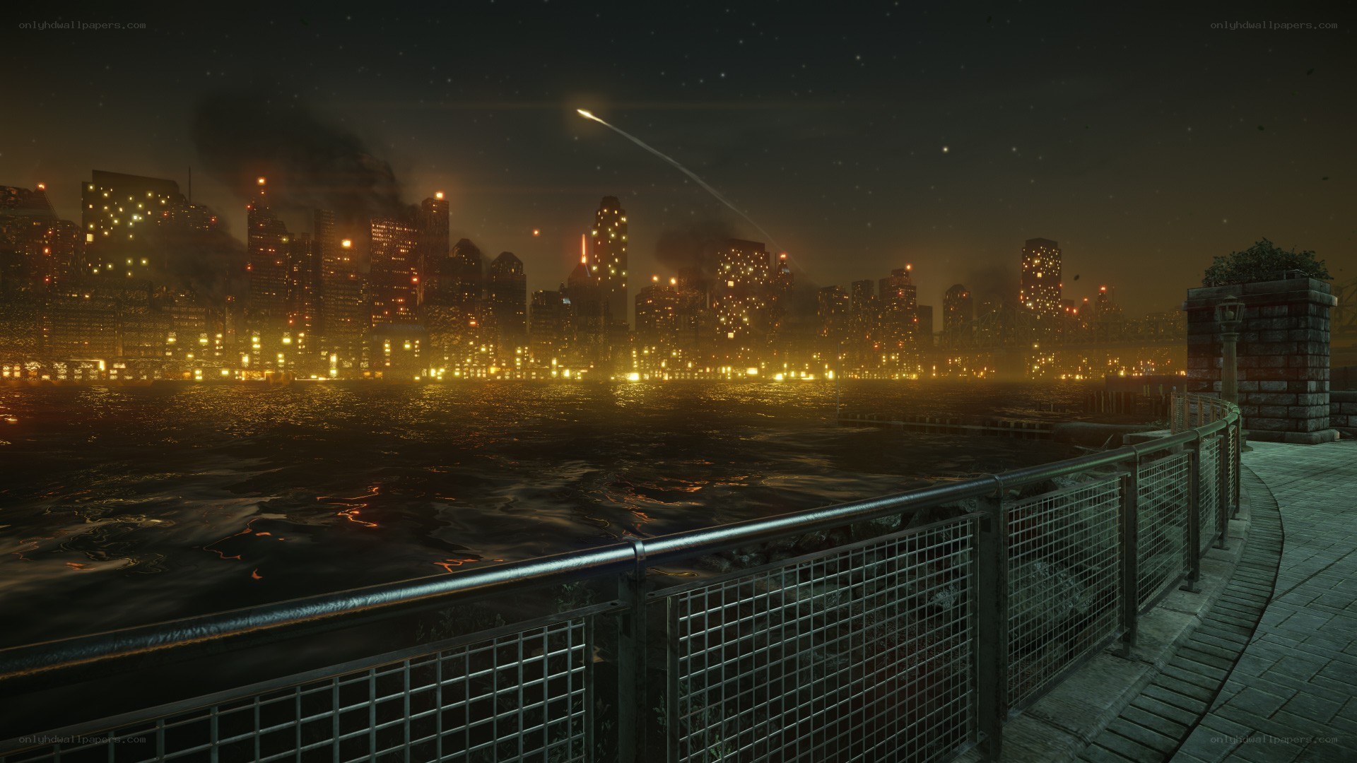 City skyline at night with rocket