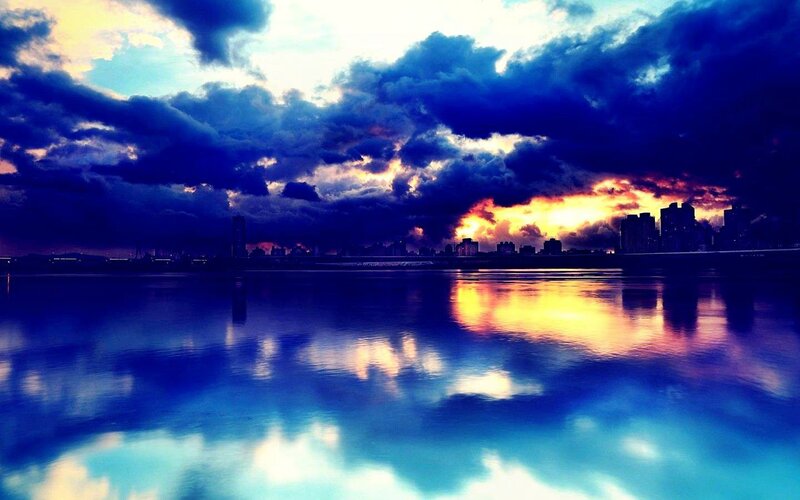 City Skyline at Sunset — Blue, Dramatic, Photograph, Sky