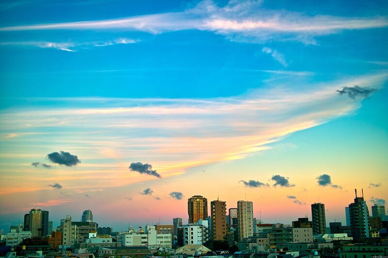 City Skyline at Sunset — Blue, Serene, Photograph, Buildings, Clouds