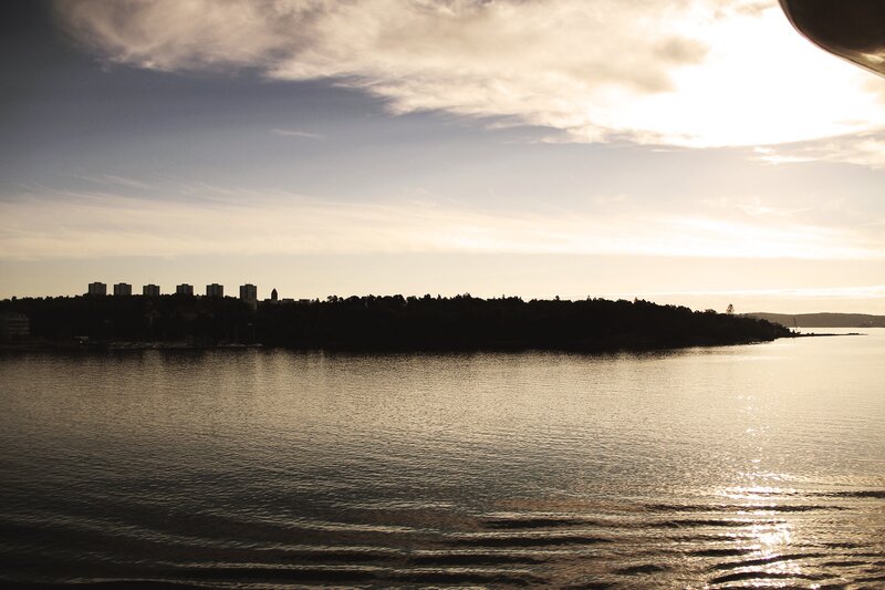 City Skyline at Sunset — Blue, Serene, Photograph, Sky, Water