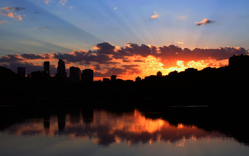 City Skyline at Sunset — Orange, Clouds