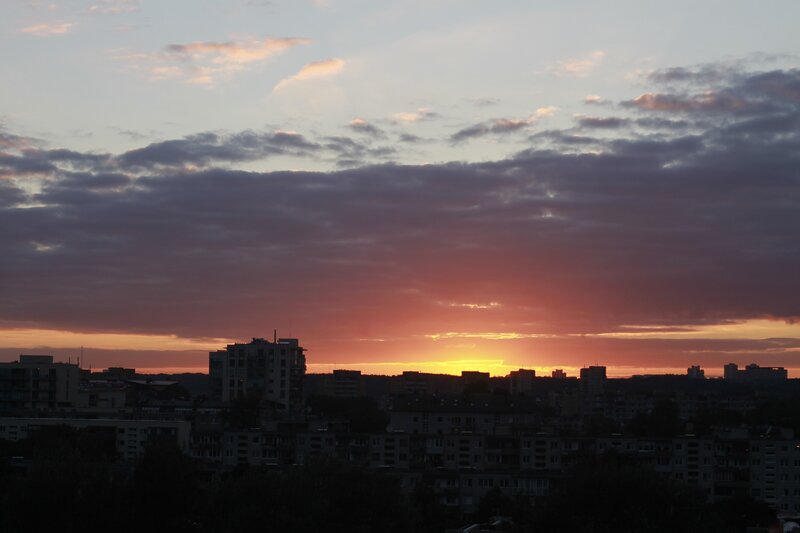 City Skyline at Sunset — Orange, Dramatic, Photograph, Buildings, Clouds