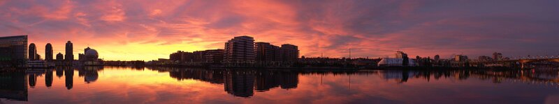 City Skyline at Sunset — Orange, Dramatic, Photograph, Buildings, River