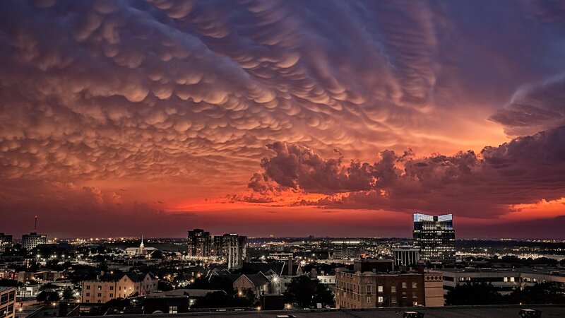 City Skyline at Sunset — Orange, Dramatic, Photograph, Clouds, Buildings, Lights
