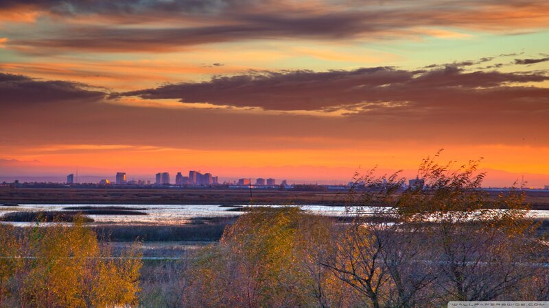 City Skyline at Sunset — Orange, Dramatic, Photograph, Marsh