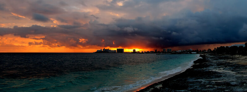 City Skyline at Sunset — Orange, Dramatic, Photograph, Ocean, Clouds