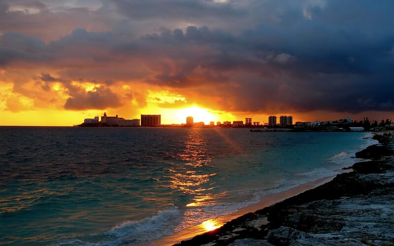 City Skyline at Sunset — Orange, Dramatic, Photograph, Ocean