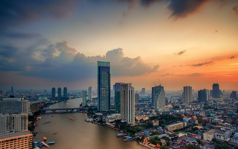 City Skyline at Sunset — Orange, Dramatic, Photograph, River, Skyscrapers