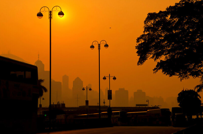 City Skyline at Sunset — Orange, Dramatic, Photograph, Streetlights
