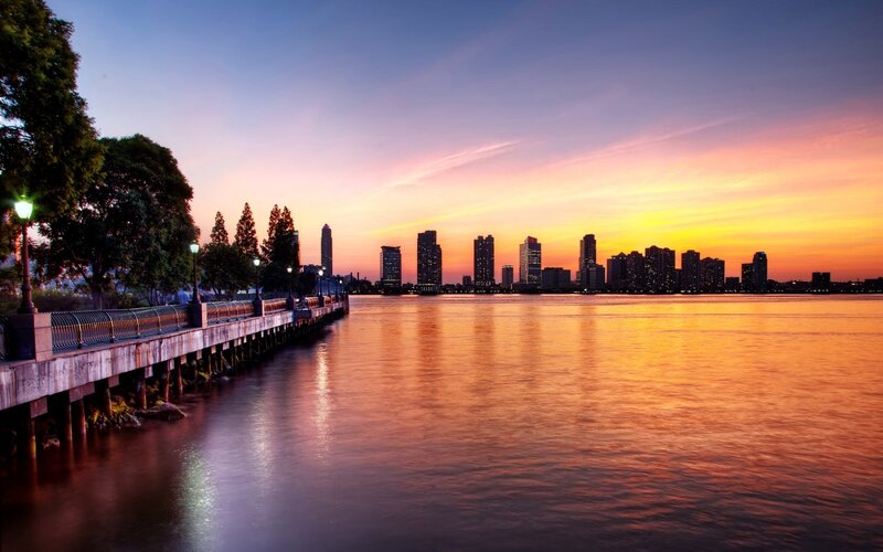 City Skyline at Sunset — Orange, Serene, Photograph, Pier, Trees