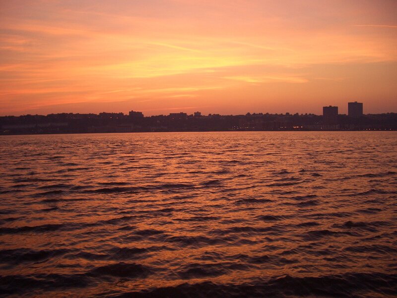 City Skyline at Sunset — Orange, Serene, Photograph, Sky, Water