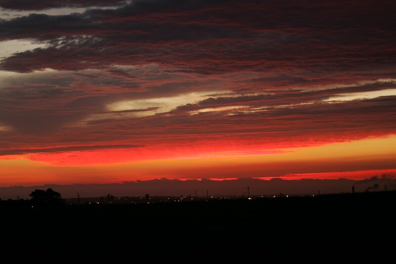 City Skyline at Sunset — Red, Dramatic, Photograph, Clouds, Sky