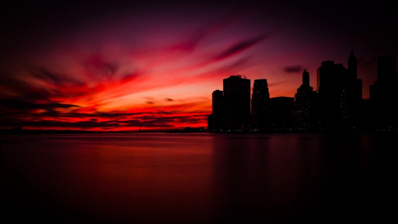 City Skyline at Sunset — Red, Dramatic, Photograph, Sky, Water