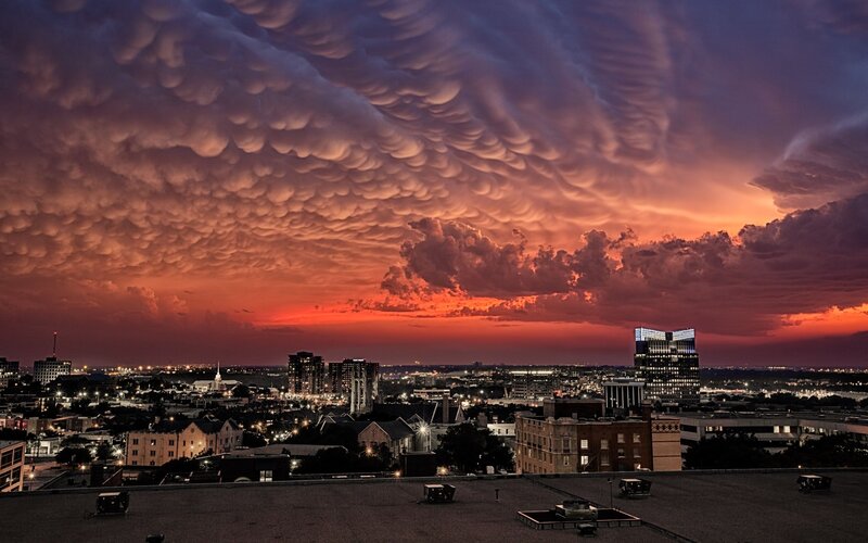 City skyline at sunset with mammatus clouds