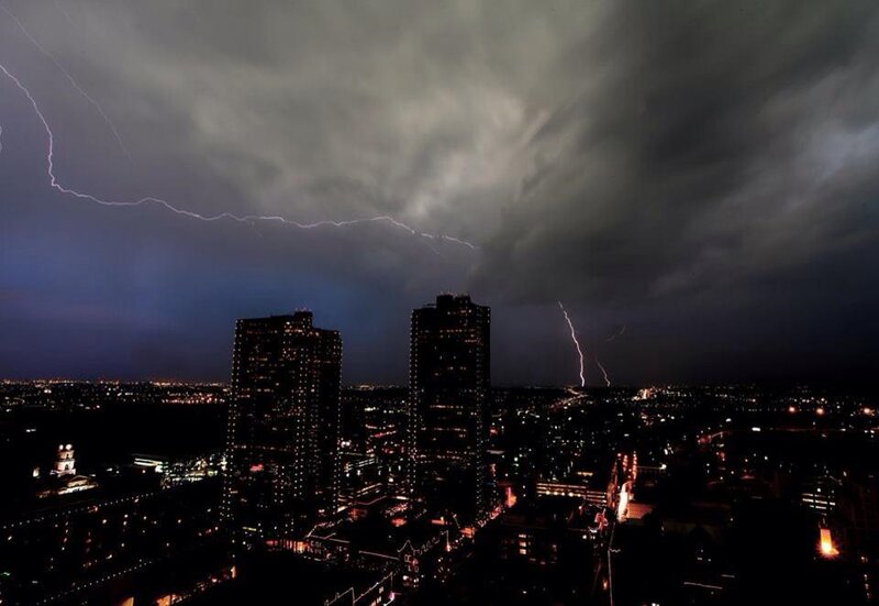 City Skyline During Storm — Black