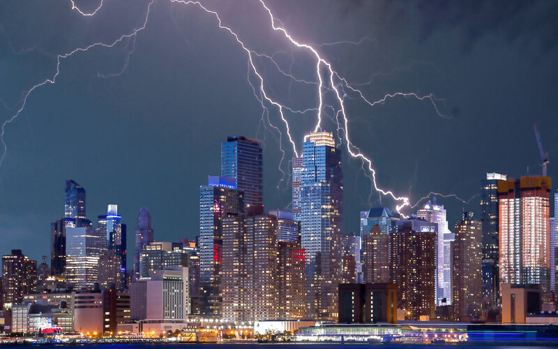 City Skyline During Storm — Blue, Dramatic