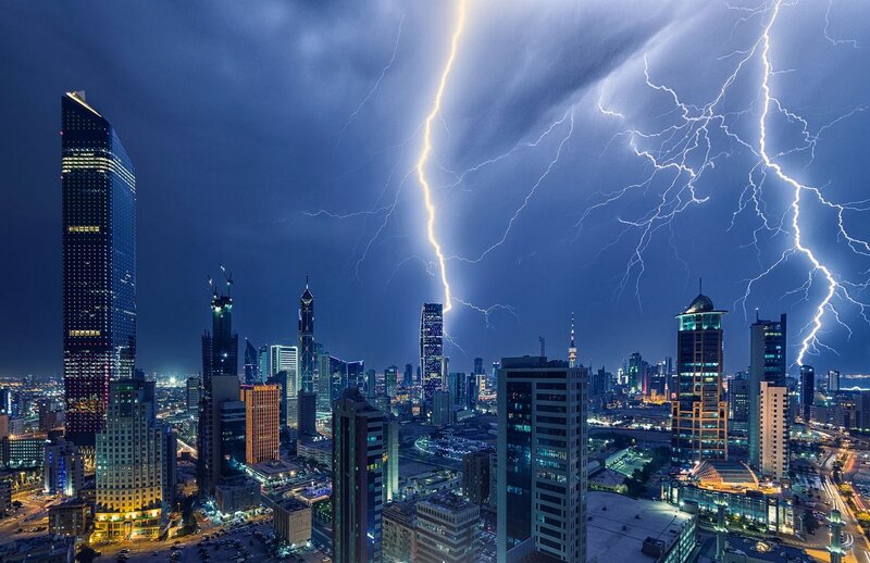 City Skyline During Storm — Blue