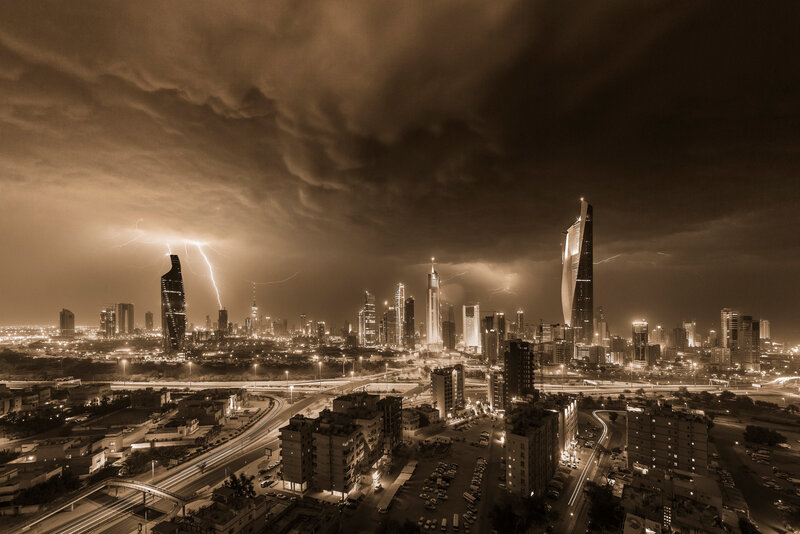 City Skyline During Storm — Brown