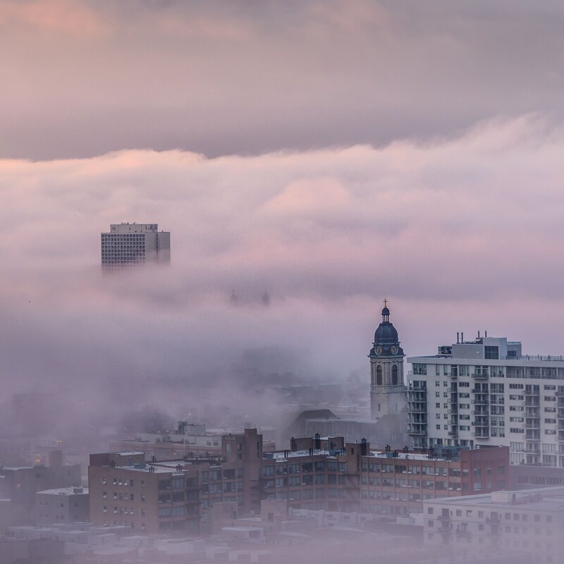 City skyline in morning fog