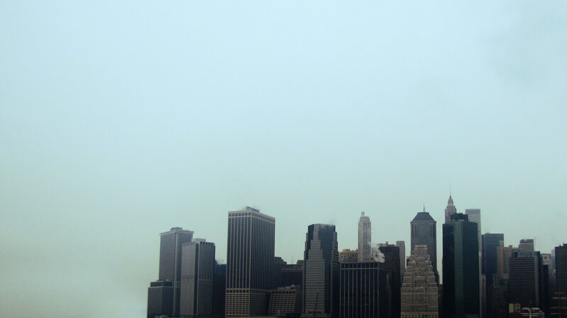 city skyline on a foggy day
