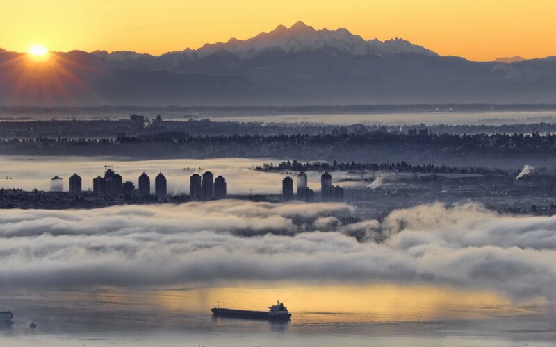 City Skyline over Fog — Orange