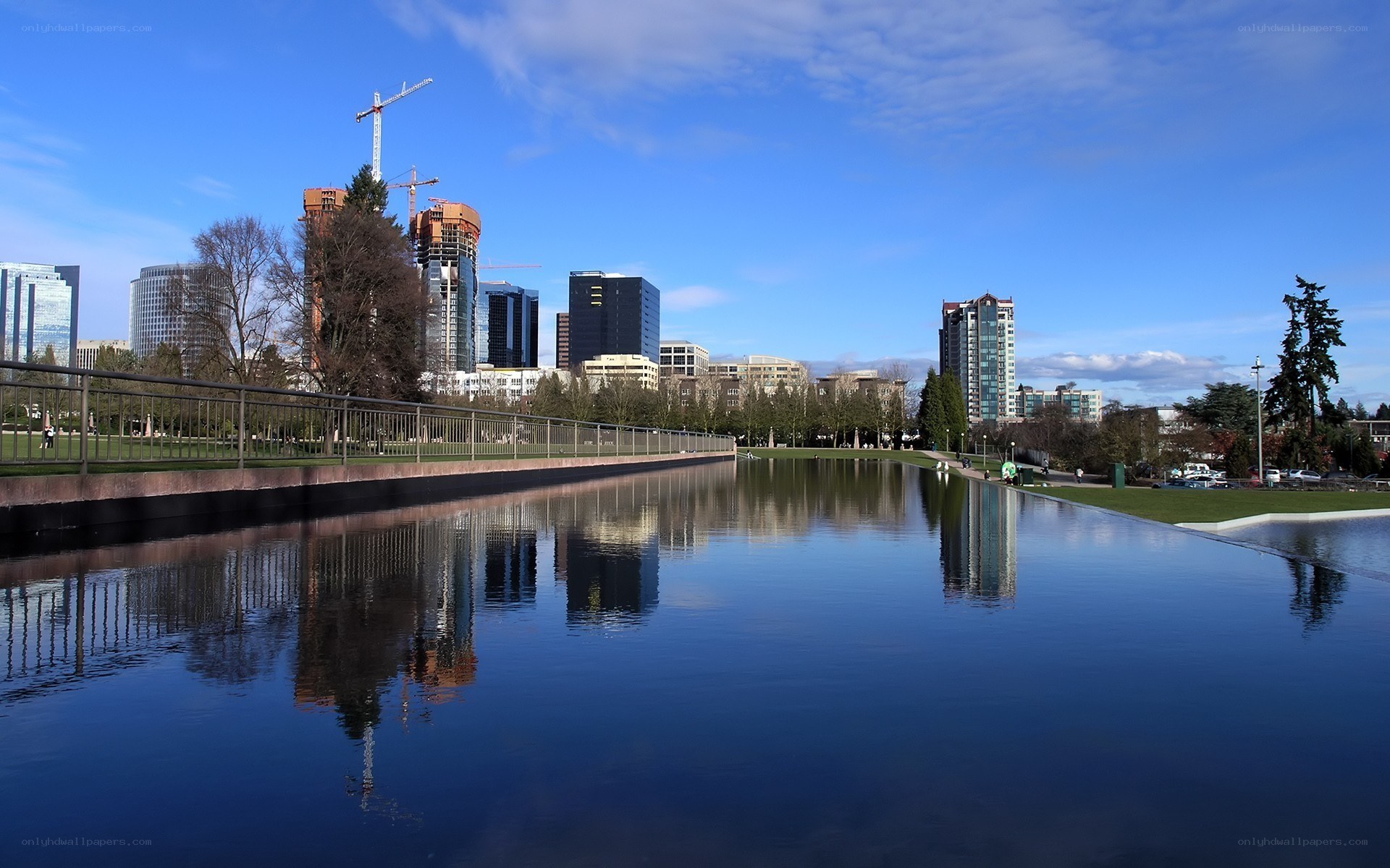 City skyline reflected in water