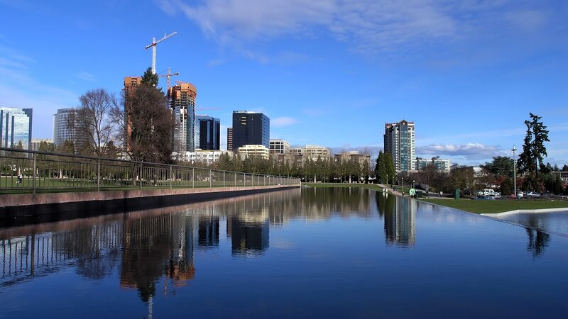 City Skyline Reflection — Blue, Serene, Afternoon, Photograph