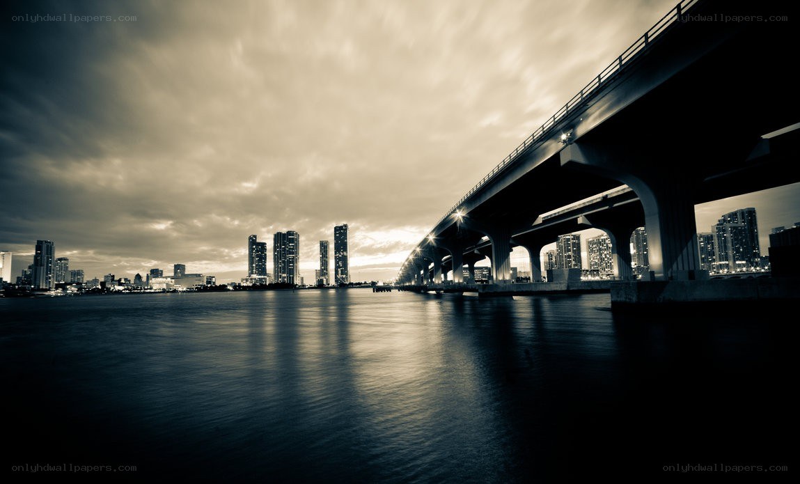 City skyline under a bridge