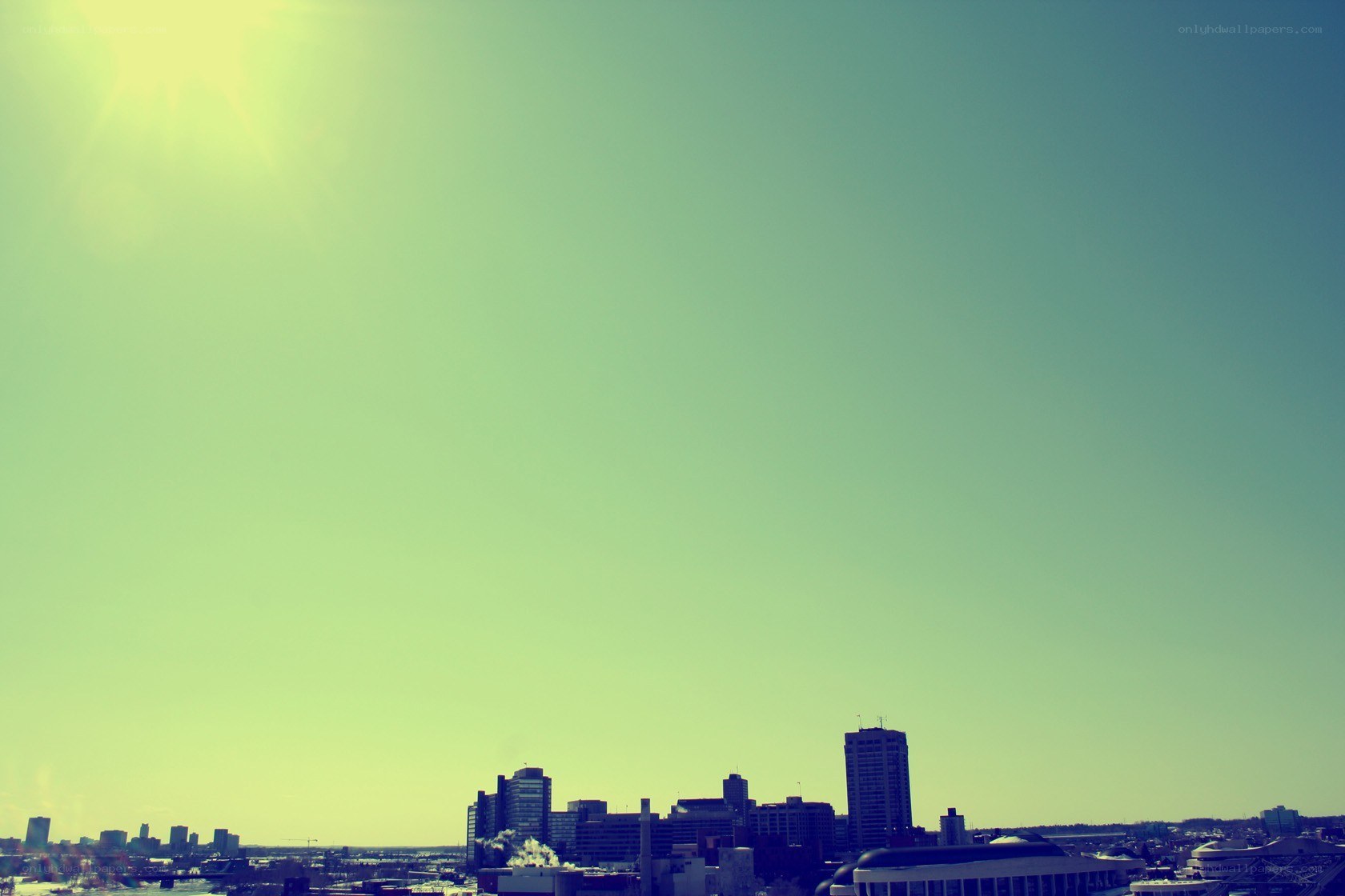 City skyline under bright sun