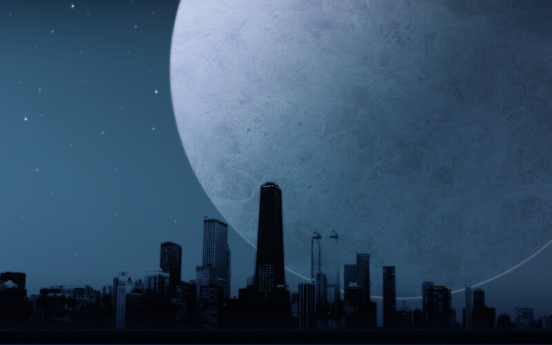 City skyline under giant moon