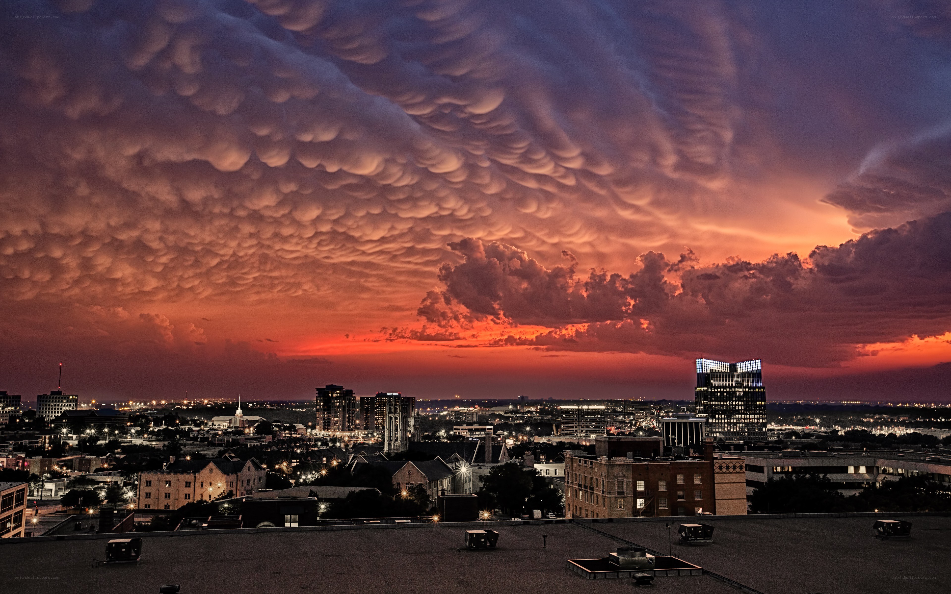 City skyline under mammatus clouds