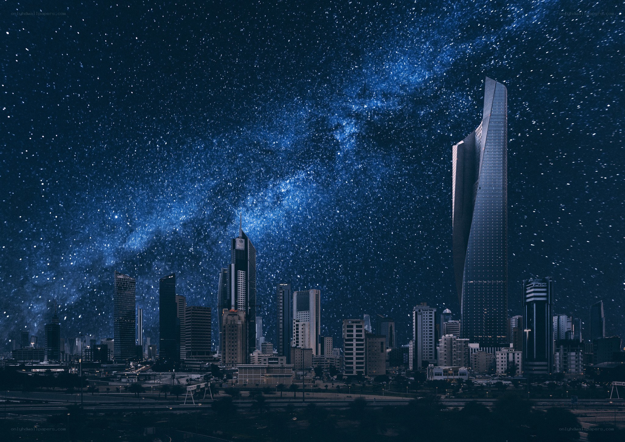 City skyline under starry sky
