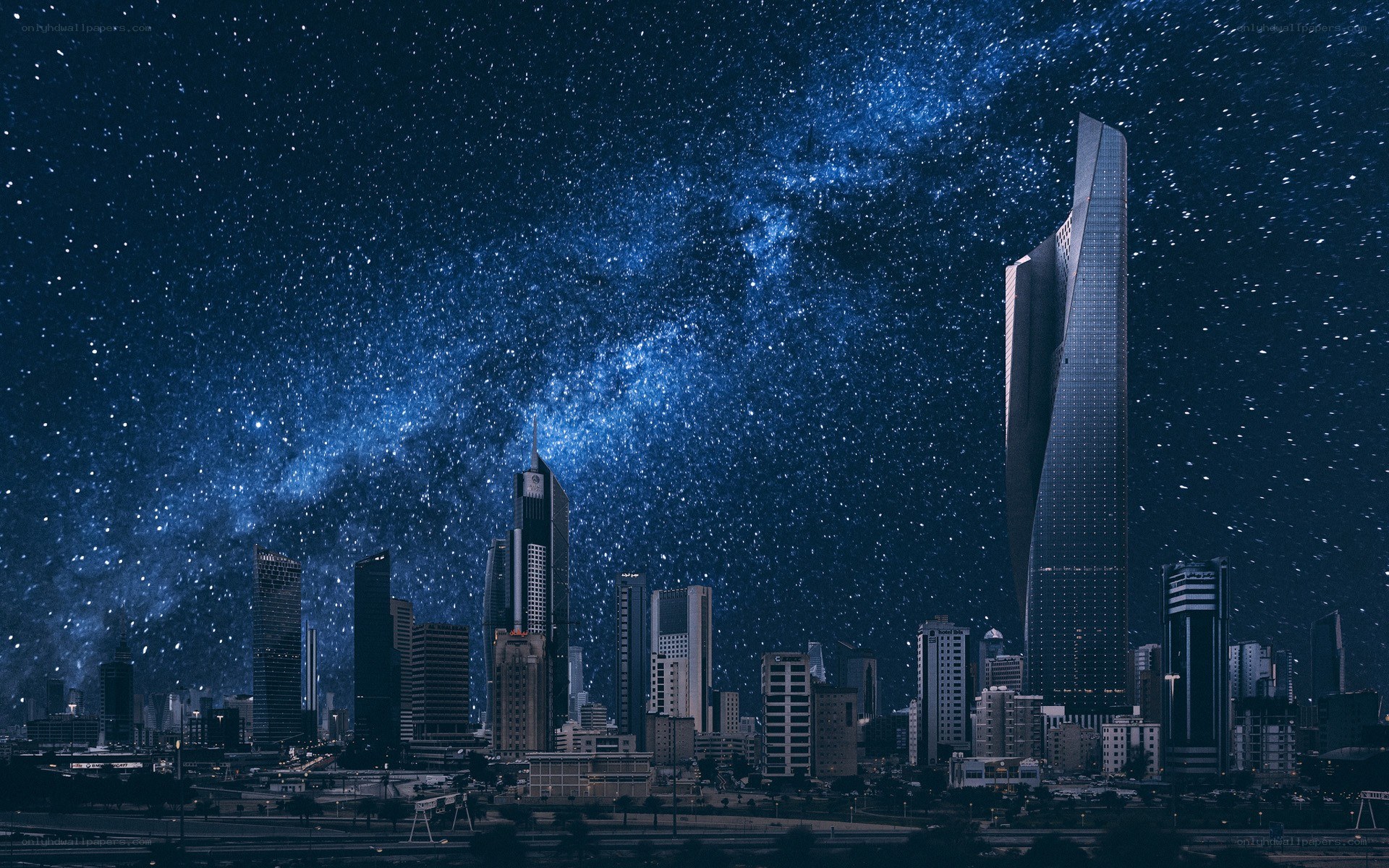 City skyline under starry sky