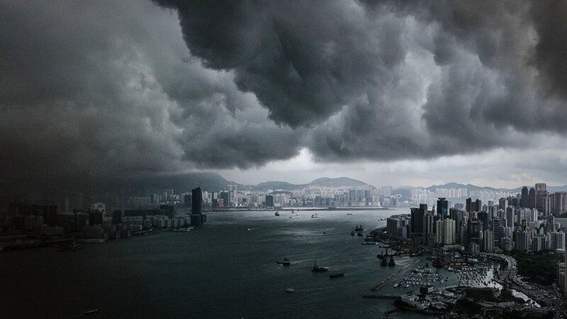 City Skyline under Storm Clouds — Gray, Dramatic, Afternoon