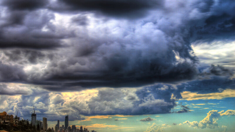 City Skyline under Storm Clouds — Gray, Dramatic