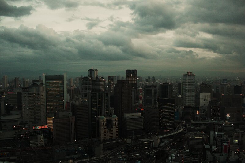 City skyline under stormy sky