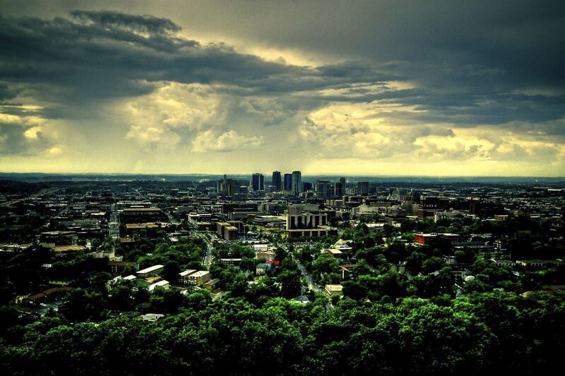 City skyline under stormy sky
