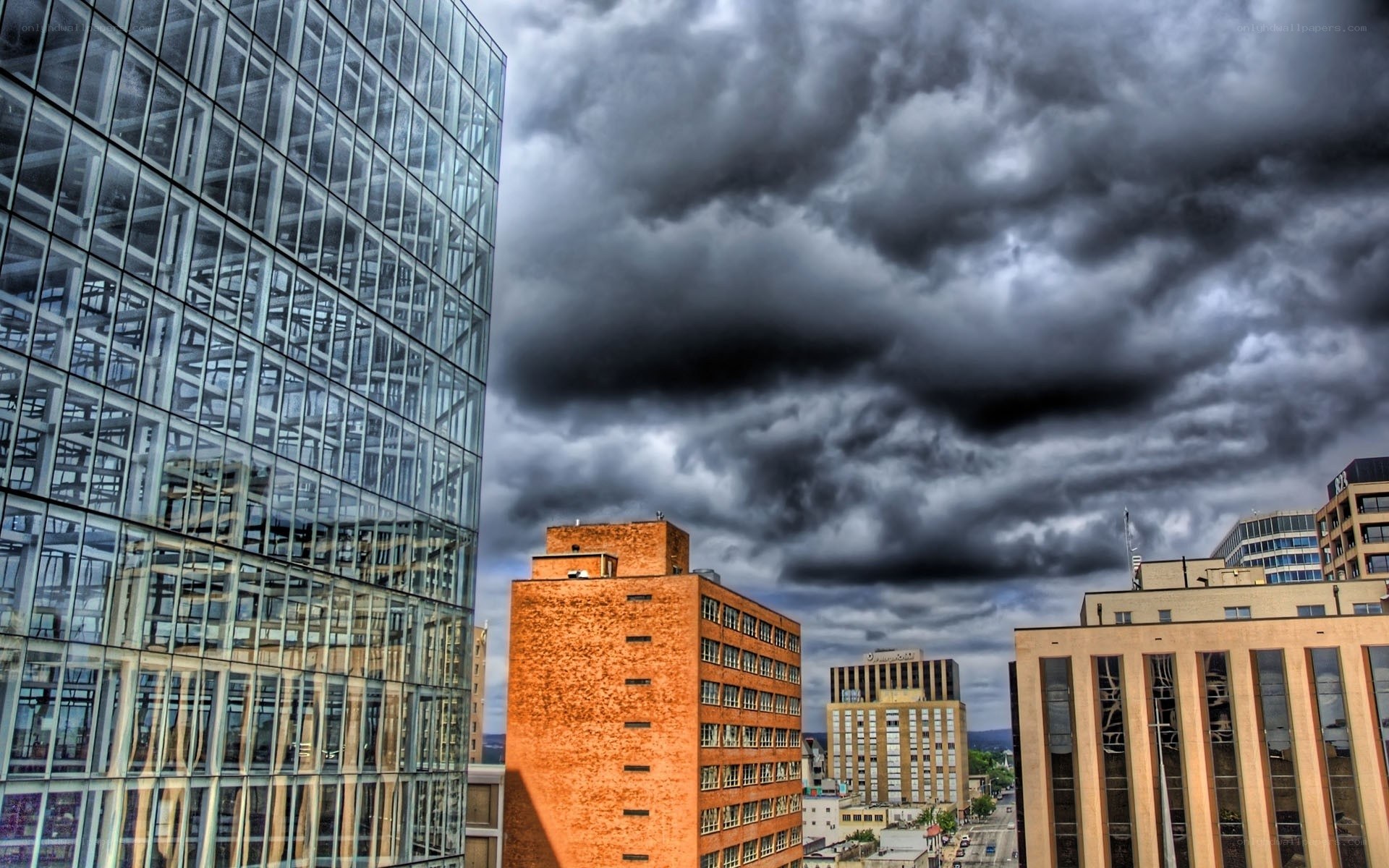 City skyline under stormy sky
