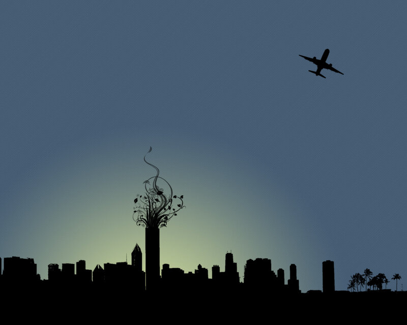 city skyline with airplane