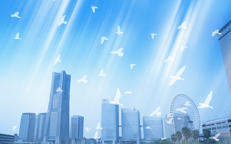 City skyline with birds and light rays