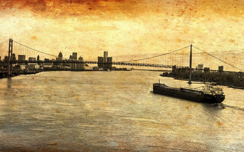 City skyline with bridge and ship