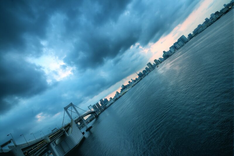 City skyline with bridge at dusk